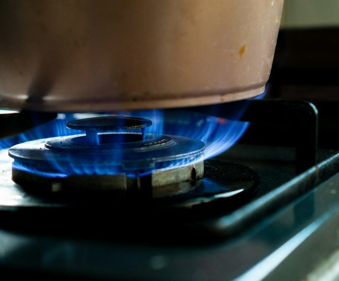 Pot of homemade soup simmering on a stove in a Czech kitchen